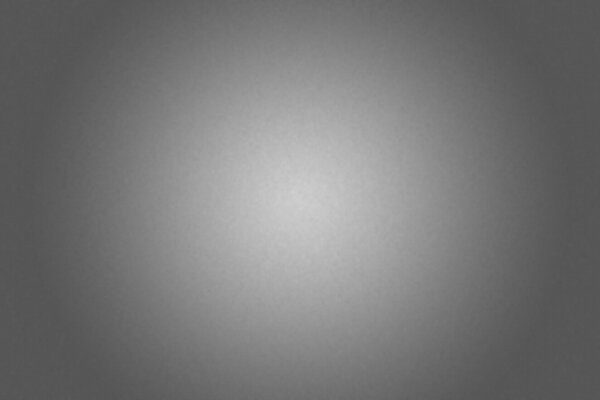 Gris minimal avec illumination au milieu de fond