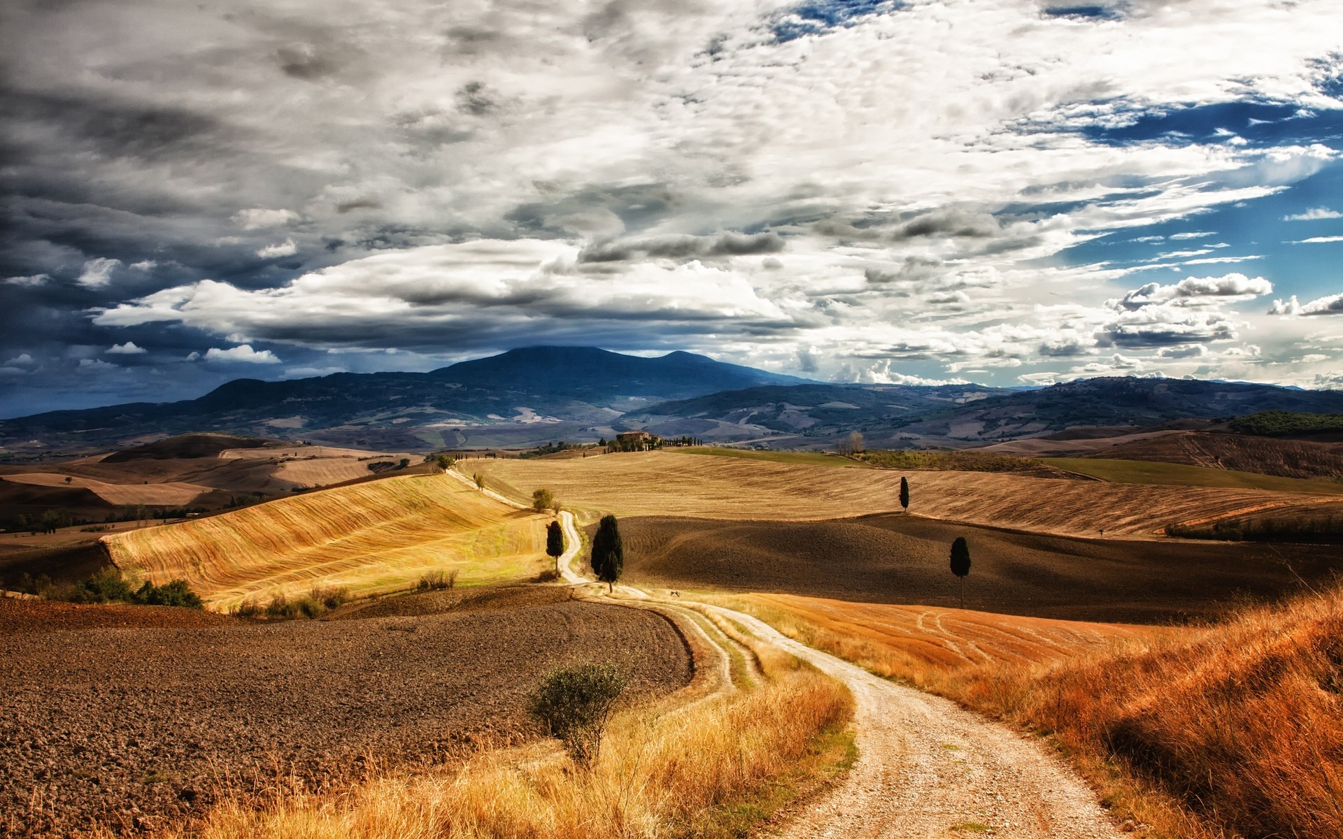 italie paysage désert ciel voyage nature sec à l extérieur scénique coucher de soleil montagnes roche stérile aube route sable colline aride toscane toscane arrière-plan