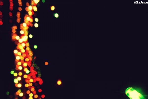 Économiseur d écran sombre avec des lumières de Noël