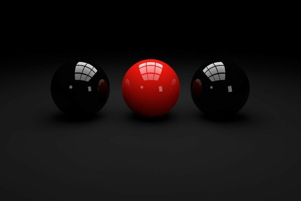 Deux boules noires et une rouge