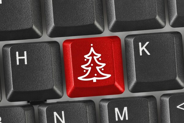 Bouton rouge avec l image de chevrons sur le clavier noir