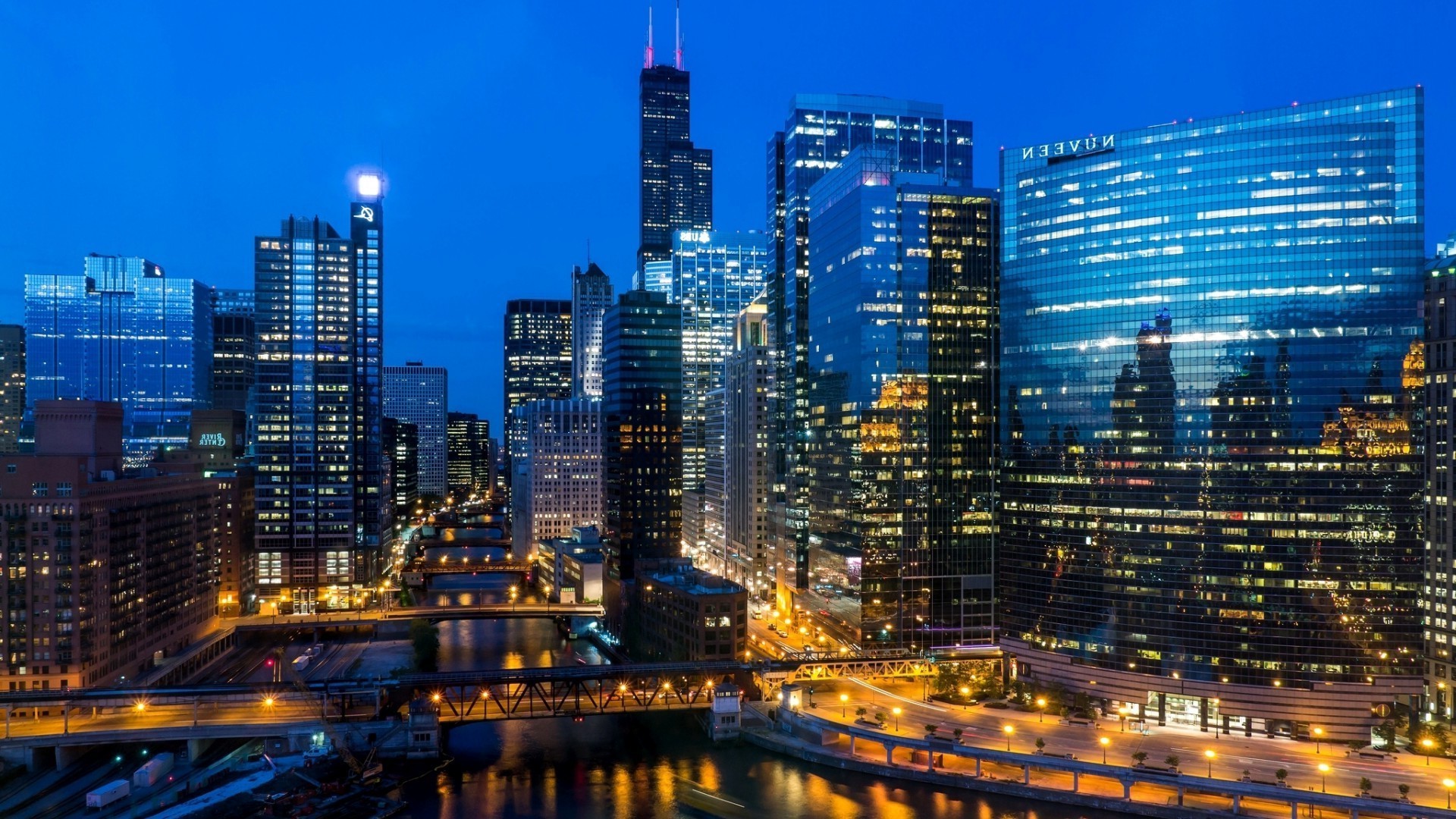 gratte-ciel ville centre-ville ville architecture crépuscule skyline maison bureau rétro-éclairé entreprise trafic voyage moderne soir tour ciel urbain finance