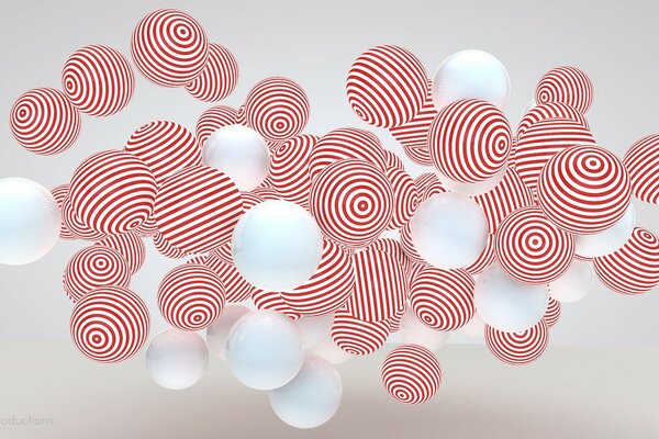 Ballons blancs et rayés planant dans l air