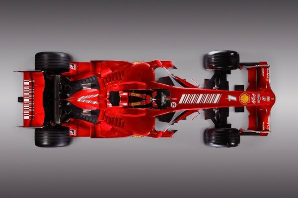 Voiture de course rouge de formule 1. Vue de dessus